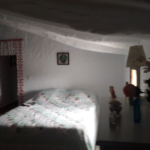 Photo showing a cosy double bedroom in rustic Andalusian farmhouse