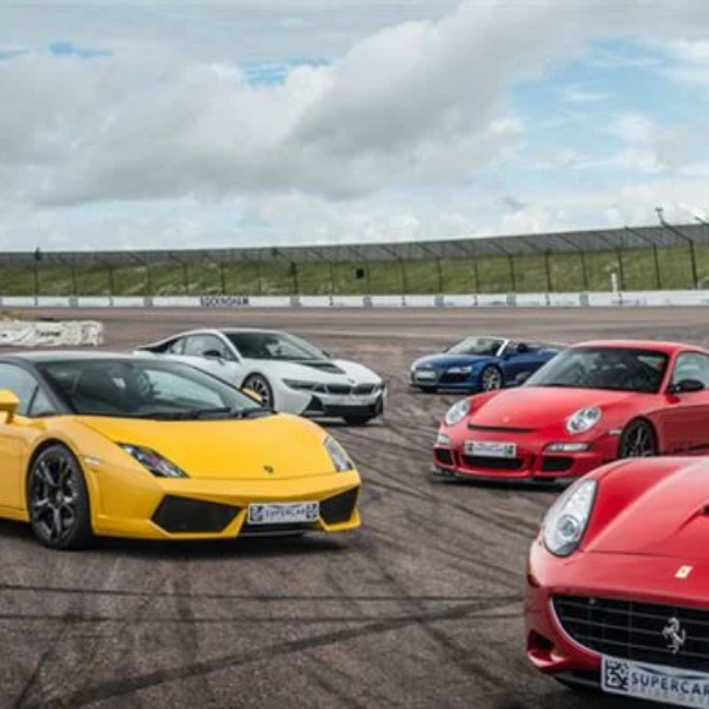 Images showing brightly coloured supercars parked on runway